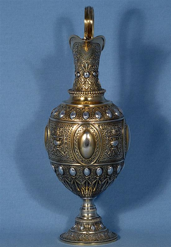 A mid Victorian parcel gilt silver ovoid shaped wine ewer/ claret jug, Height 13 ½”/340mm Weight 23.oz/653grms